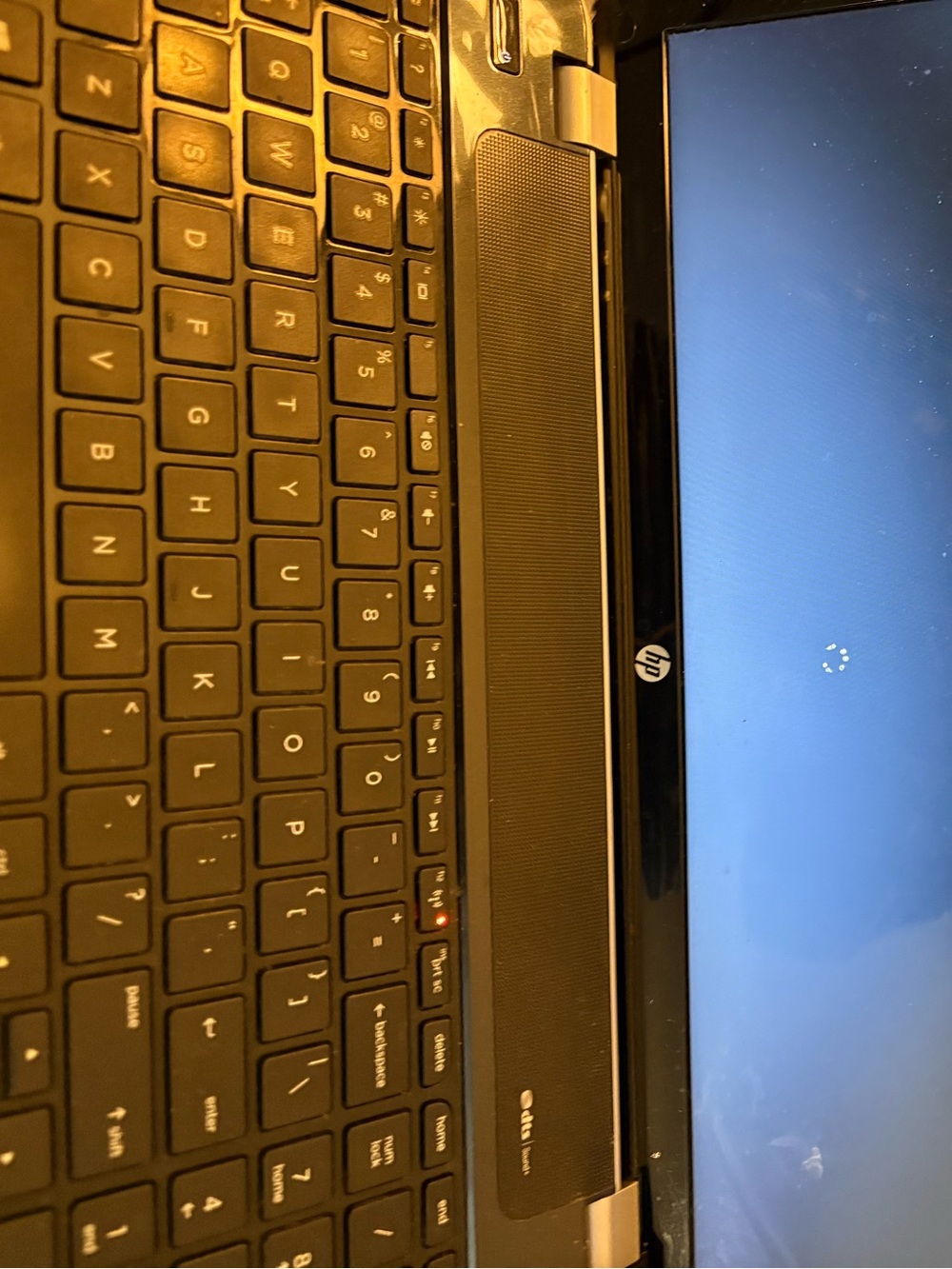 HP Black Laptop with Glossy Black Bezel and Matte Black Keyboard